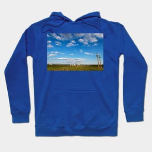 Blue cloudy sky over factory, industrial zone, Romania Hoodie